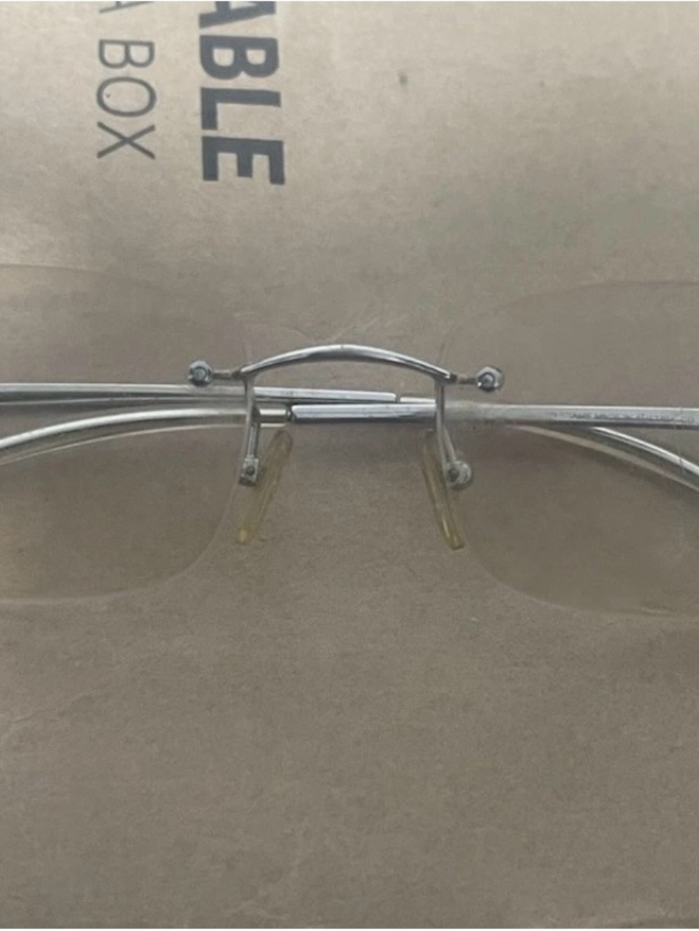 Dior Silver Rimless Sunglasses with Light Brown Lenses